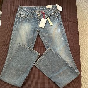 NWT Guess jeans.  Boot cut, very low rise, slim fit.  Size 28 RG